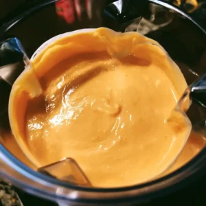 Blended cottage cheese buffalo sauce for high protein buffalo chicken mac and cheese
