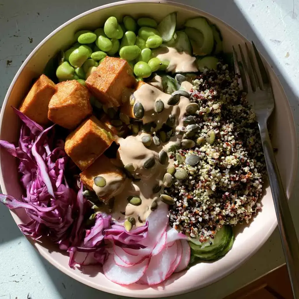 High Protein Salads Recipe 1 : salad with beans, tofu and creamy tahini dressing in a bowl