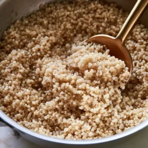 Fluffy cooked tri-color quinoa in a pot for a high protein vegan salad
